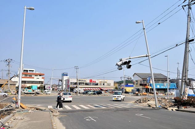 Street crossing in Onahama, earthquake and tsunami damage visible