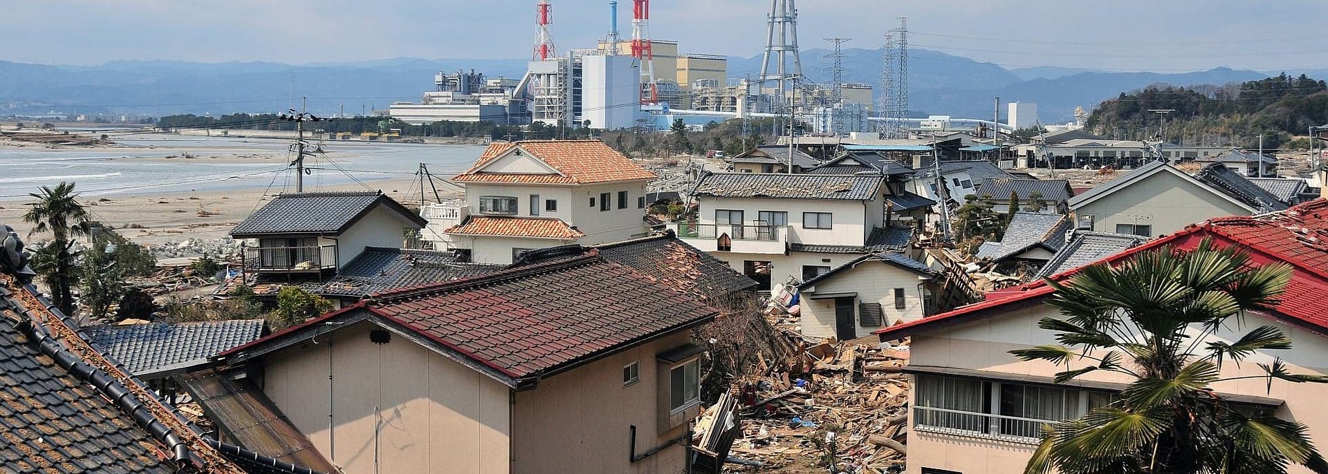Destroyed buildings and debris near river after Tohoku earthquake and tsunami